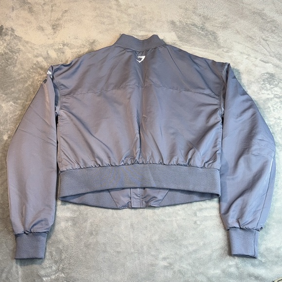 🎯NWOT Gymshark Lo Bomber Jacket Steel Blue Size Small - Picture 11 of 12
